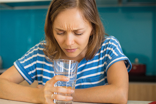 Woman Bored of Drinking Water