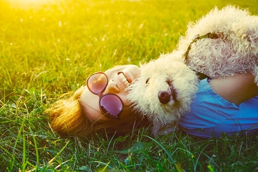 happy-woman-smiling-dog