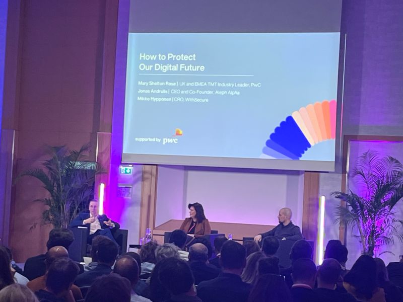 null One of TED AI highlights showing the stage talk about how to protect our digital future. In picture are Mary Shelton Rose - Industry Leader at PWC, Jonas Andrulis, CEO & Co-Founder Aleph Alpha, and Mikko Hypponen CRO at WithSecure.