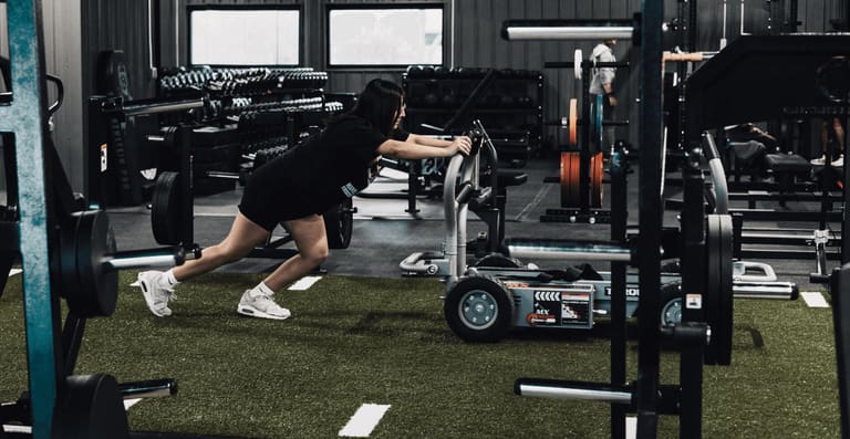 Squat rack and racks of plates at SBC MHK