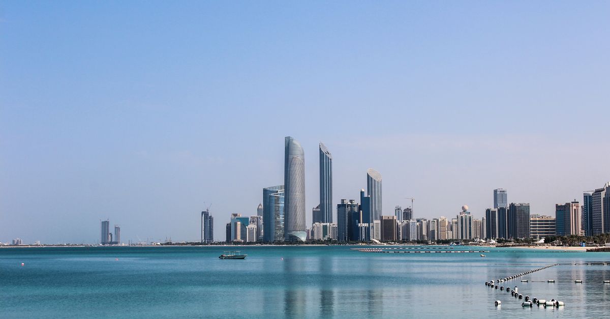Abu Dhabi skyline with the Corniche and Etihad Towers