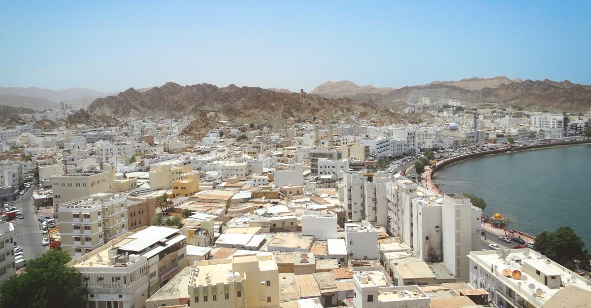 Muscat cityscape with traditional architecture and modern skyline