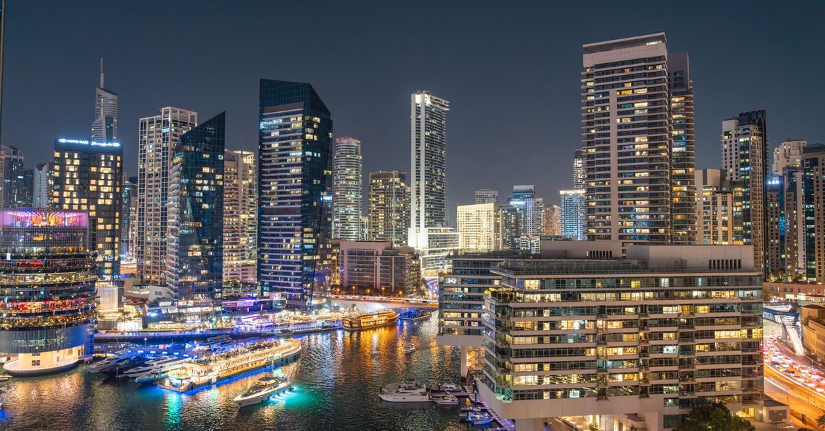 Dubai skyline with Burj Khalifa and the city at night