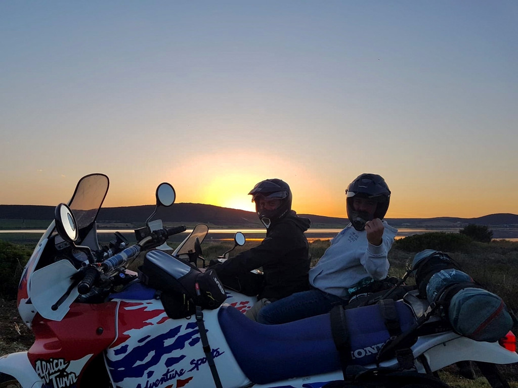 Friends and Africa Twins in the sunset