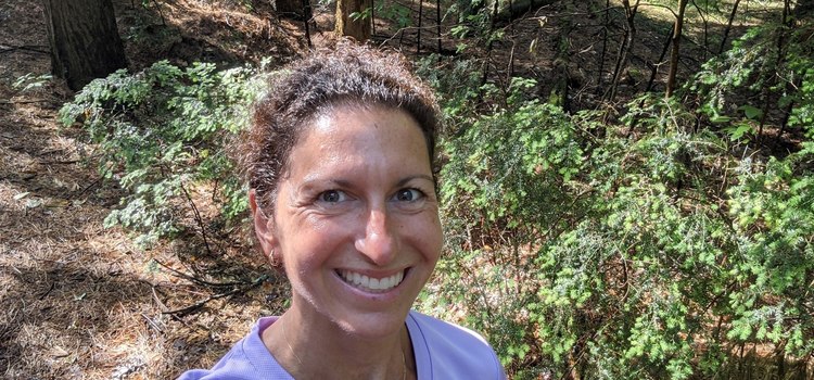 woman walking in forest