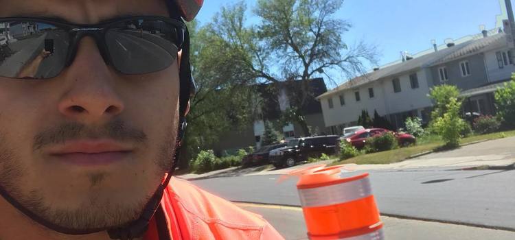 man biking in orange