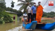 Minister Bandula travels by boat to observe flood situation