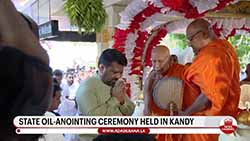 Customary anointing of oil for New Year performed at temples across the island (English)