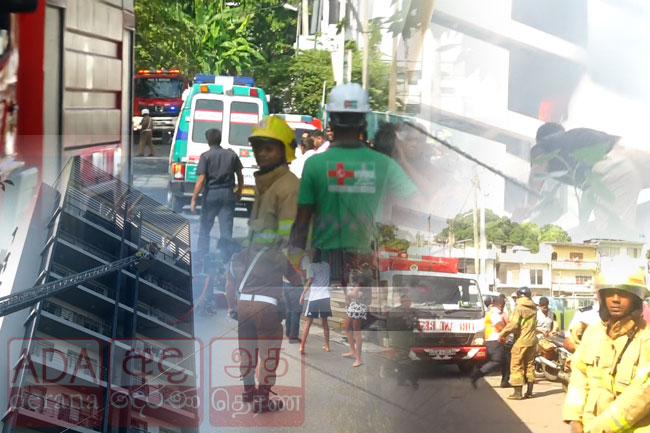 ගින්න හේතුවෙන් මහල් නිවාස සංකීර්ණයේ සිරවී සිටින පිරිස මුදාගැනීමට දැඩි වෙහෙසක්