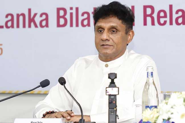 13 බලාත්මක කිරීම තම අපේක්ෂාව බව සජිත් ඉන්දියාවේදී කියයි