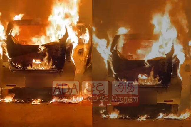 නිවසක තිබූ මෝටර් රථයක් හදිසියේ ගිනි ගනී