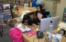 Student volunteers at our circulation desk.