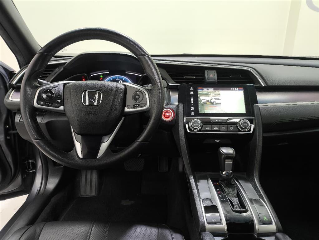 CIVIC 1.5 16V TURBO GASOLINA TOURING 4P CVT3