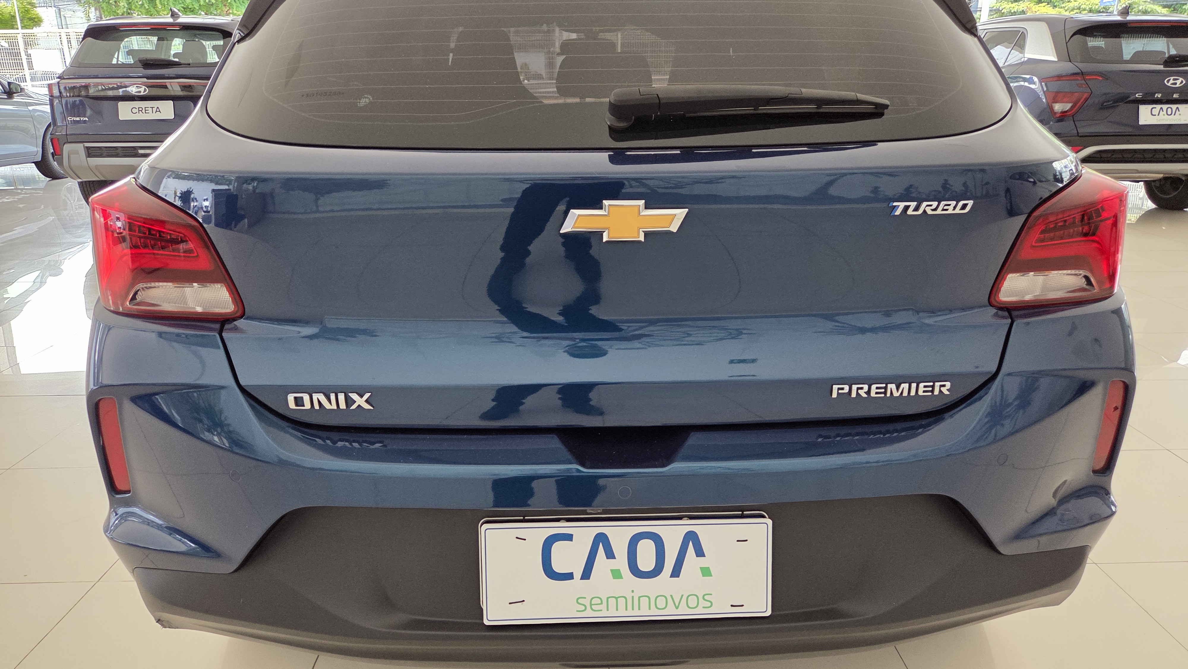 GM - Chevrolet-ONIX-1.0 TURBO FLEX PREMIER AUTOMÁTICO