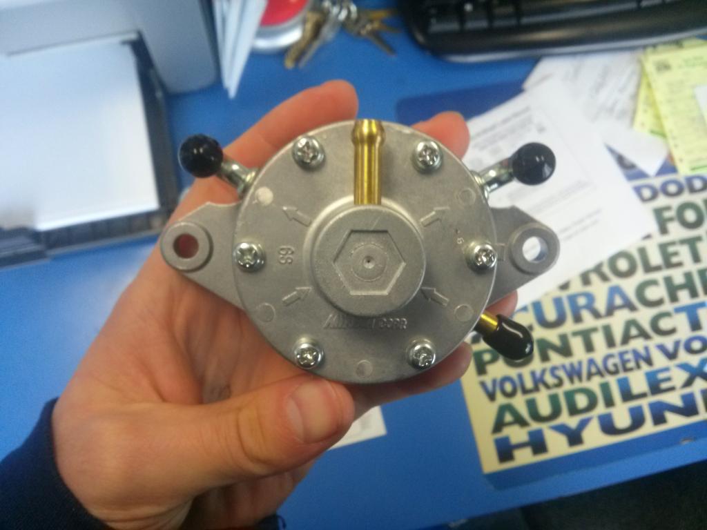 Mikuni vacuum fuel pump install and battery relocate Adventure Rider