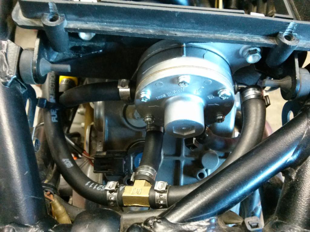 Mikuni vacuum fuel pump install and battery relocate Adventure Rider