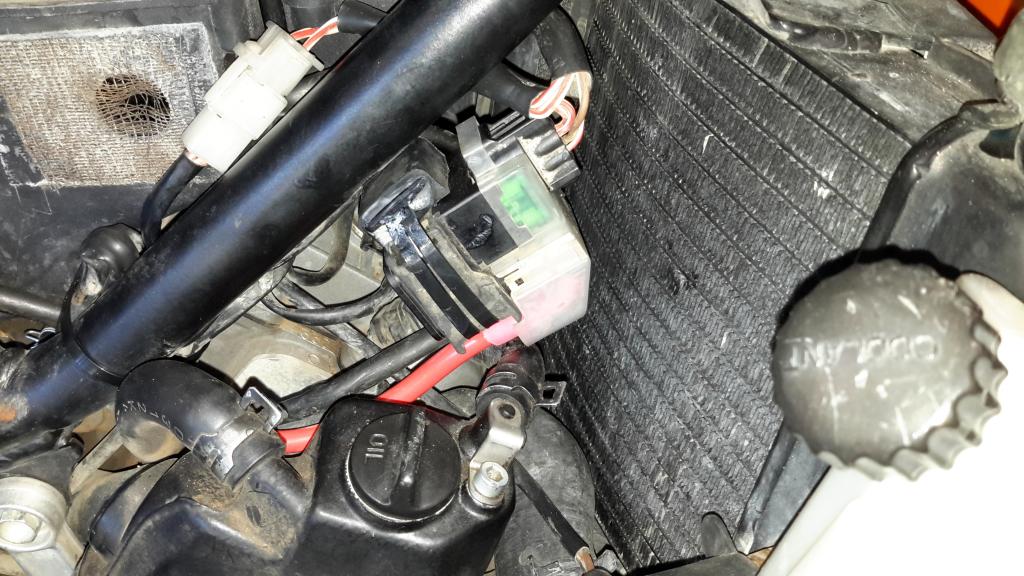 Mikuni vacuum fuel pump install and battery relocate Adventure Rider