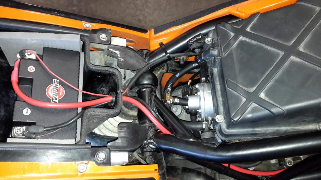 Mikuni vacuum fuel pump install and battery relocate Adventure Rider
