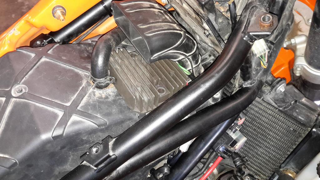 Mikuni vacuum fuel pump install and battery relocate Adventure Rider