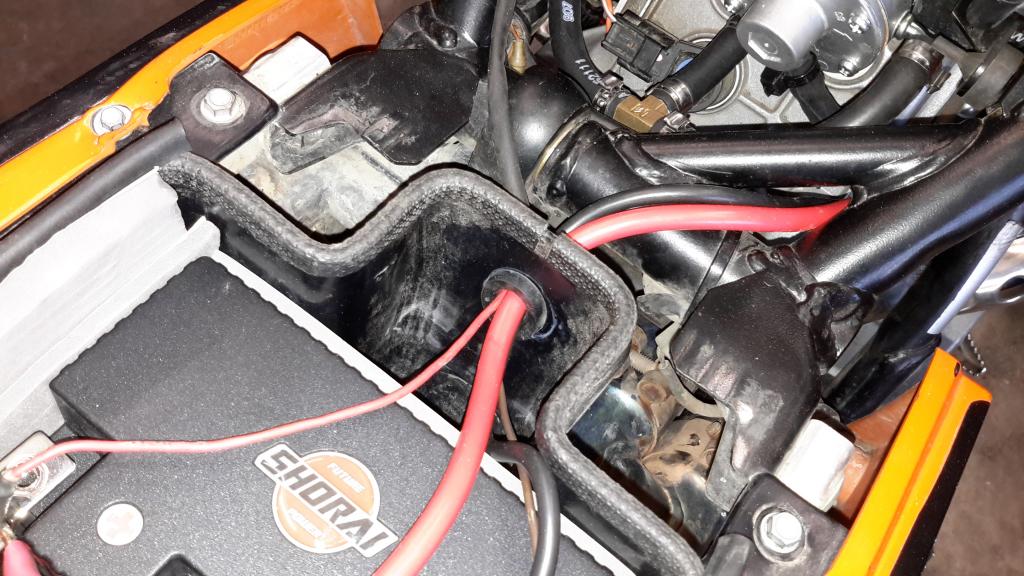 Mikuni vacuum fuel pump install and battery relocate Adventure Rider