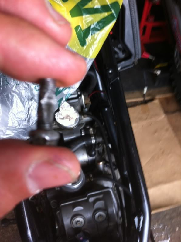 Fuel coming out of front carb intake(after engine rebuild