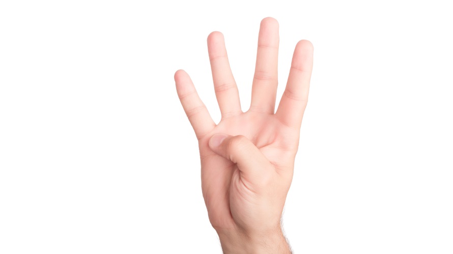 Man’s hand showing number four isolated on white background