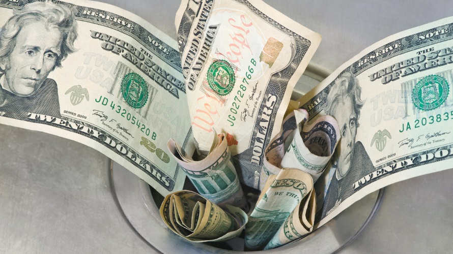 Cash dollars slipping down a drain.
