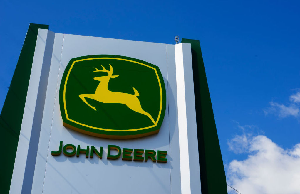 John Deere sign seen on a panel. John Deere is an American
