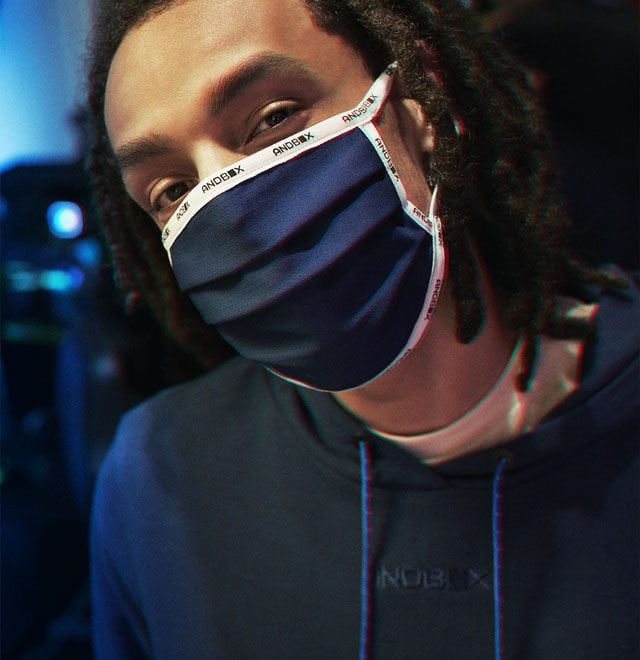 Person wearing Andbox face mask