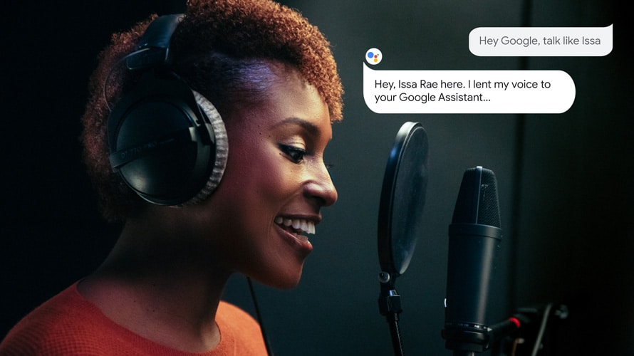 issa-rae-google-assistant-CONTENT-2019 Issa Rae talking into a microphone with headphones on and Google chat bubbles on the side for Google Assistant