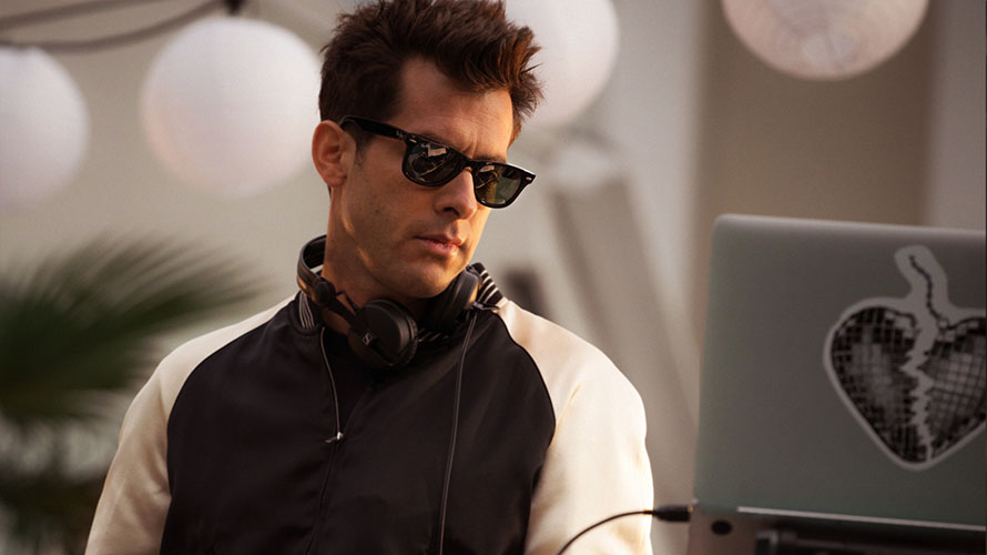 mark-ronson-chase-CONTENT-2020 Musician Mark Ronson wearing sunglasses standing in front of a laptop