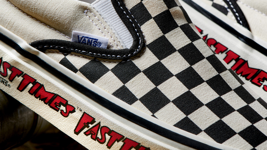 close up of front of checkerboard vans