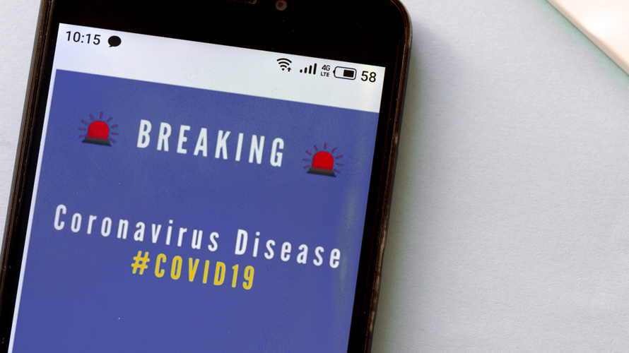 default-setting-blocking-news-CONTENT-2020 a phone showing a coronavirus alert