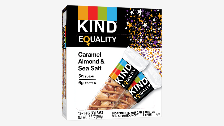 A box of KIND Equality bars features purple, white, and gold stars to celebrate women's suffrage