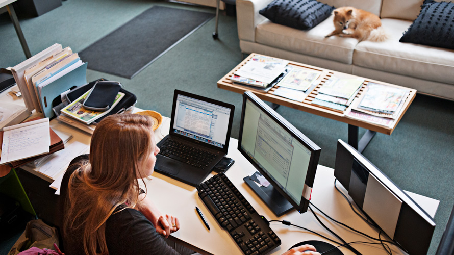 media-orgs-wfh-CONTENT-2020 woman in office working at computer