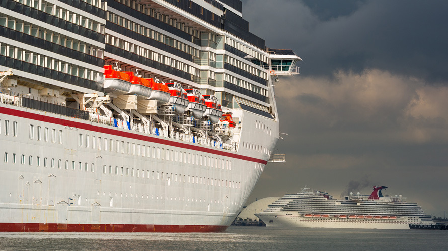 carnival-cruise-sail-CONTENT-2020 side view of a cruise ship in the water