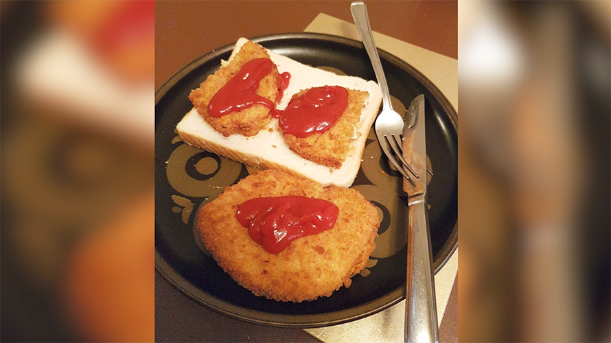 kfc-comeback-uk-2020 A photo of a chicken sandwich with ketchup on it