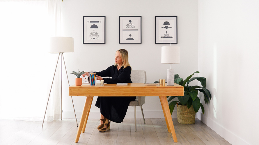 fernish-rental-furniture-CONTENT-2020 A woman sitting at a desk working