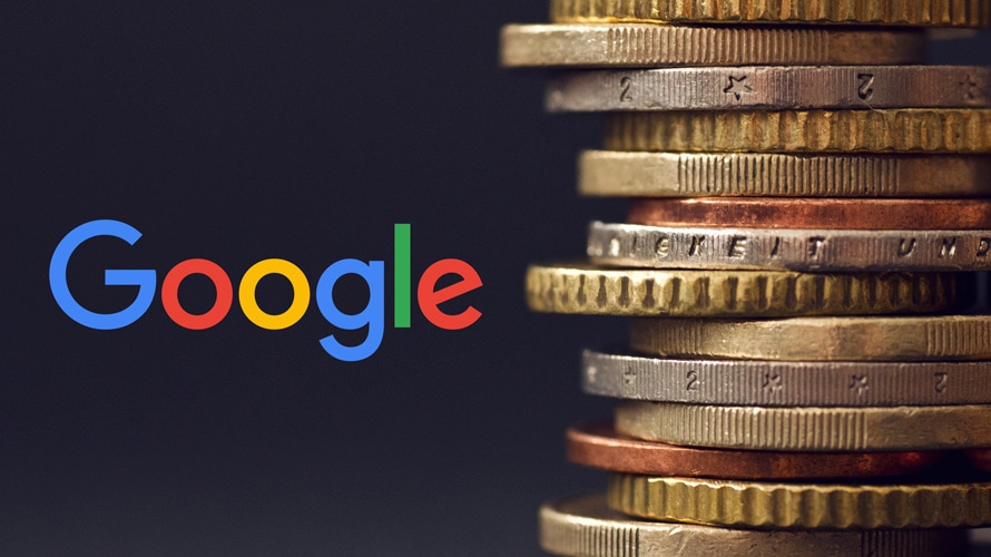 google-ad-revenue-drops-CONTENT-2020 google logo next to a stack of coins