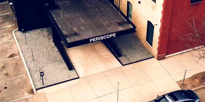 periscope-exterior-hed-page-2020 the top of a building that says periscope