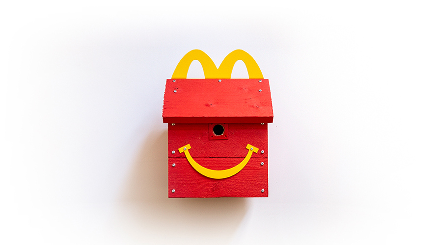 mcdonalds-happy-meal-bird-box-content-2020 a bird house shaped like a mcdonald's happy meal box