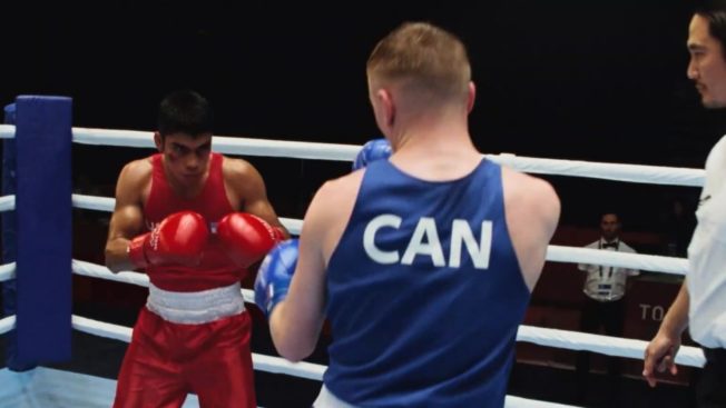 P&GOlympics Two boxers compete in the Olympics