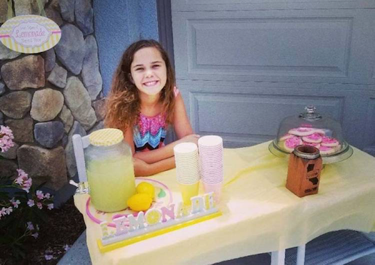 Girl selling lemonade