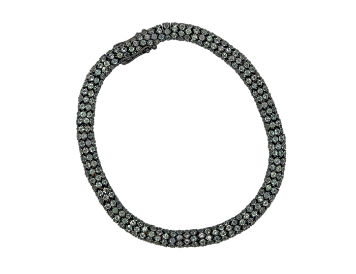 Teal sapphire bracelet in 18k white gold.
