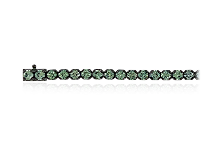 Round teal sapphire bracelet in 18k white gold.