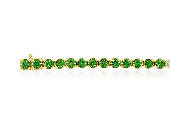 Round tsavorite bracelet in 18k yellow gold.