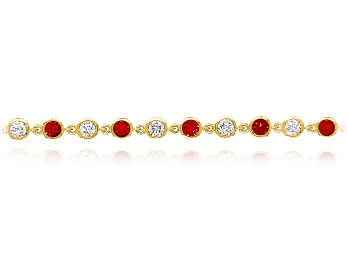 Ruby and round brilliant cut diamond bracelet in 18k yellow gold.