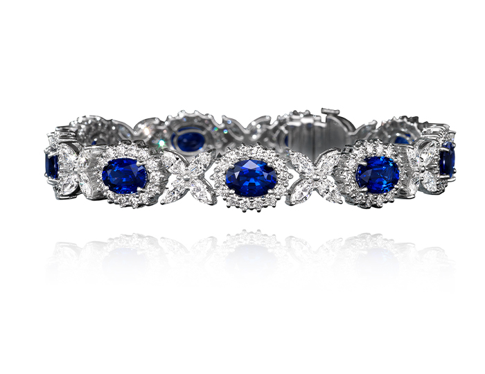 Sapphire and round brilliant cut diamond bracelet in 18k white gold.