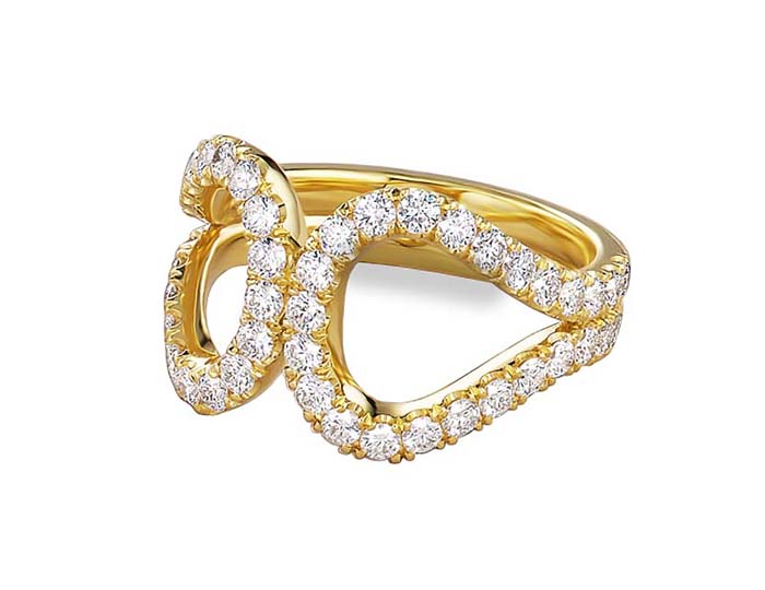 Round brilliant cut diamond ring in 18k yellow gold.