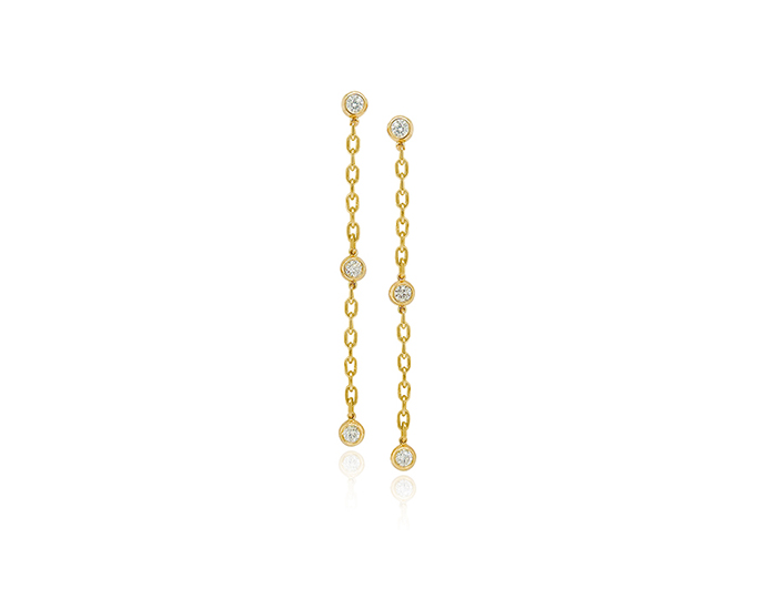 Round brilliant cut diamond bezel earrings in 18k yellow gold.